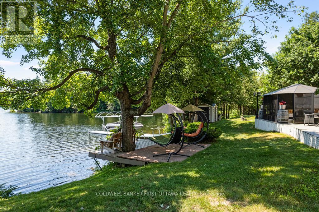 Picturesque lakefront - 320 Pike Lake Route 12 Road, Tay Valley, ON - Outdoor With Body Of Water