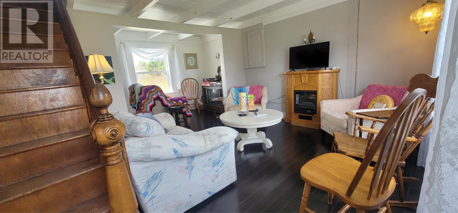 9 Quay Road, Cupids, NL - Indoor With Fireplace
