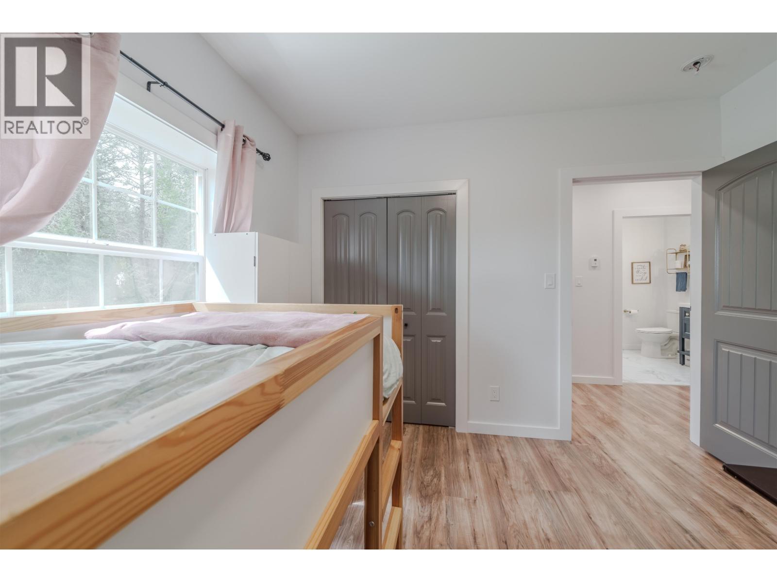 4908 Kitwanga Drive, 108 Mile Ranch, BC - Indoor Photo Showing Bedroom
