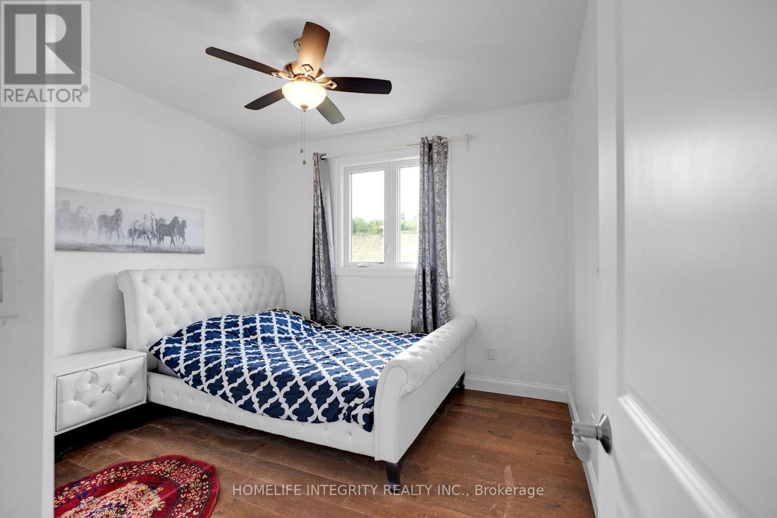 #2 Bdrm- Main - 838722 4Th Line E, Mulmur, ON - Indoor Photo Showing Bedroom