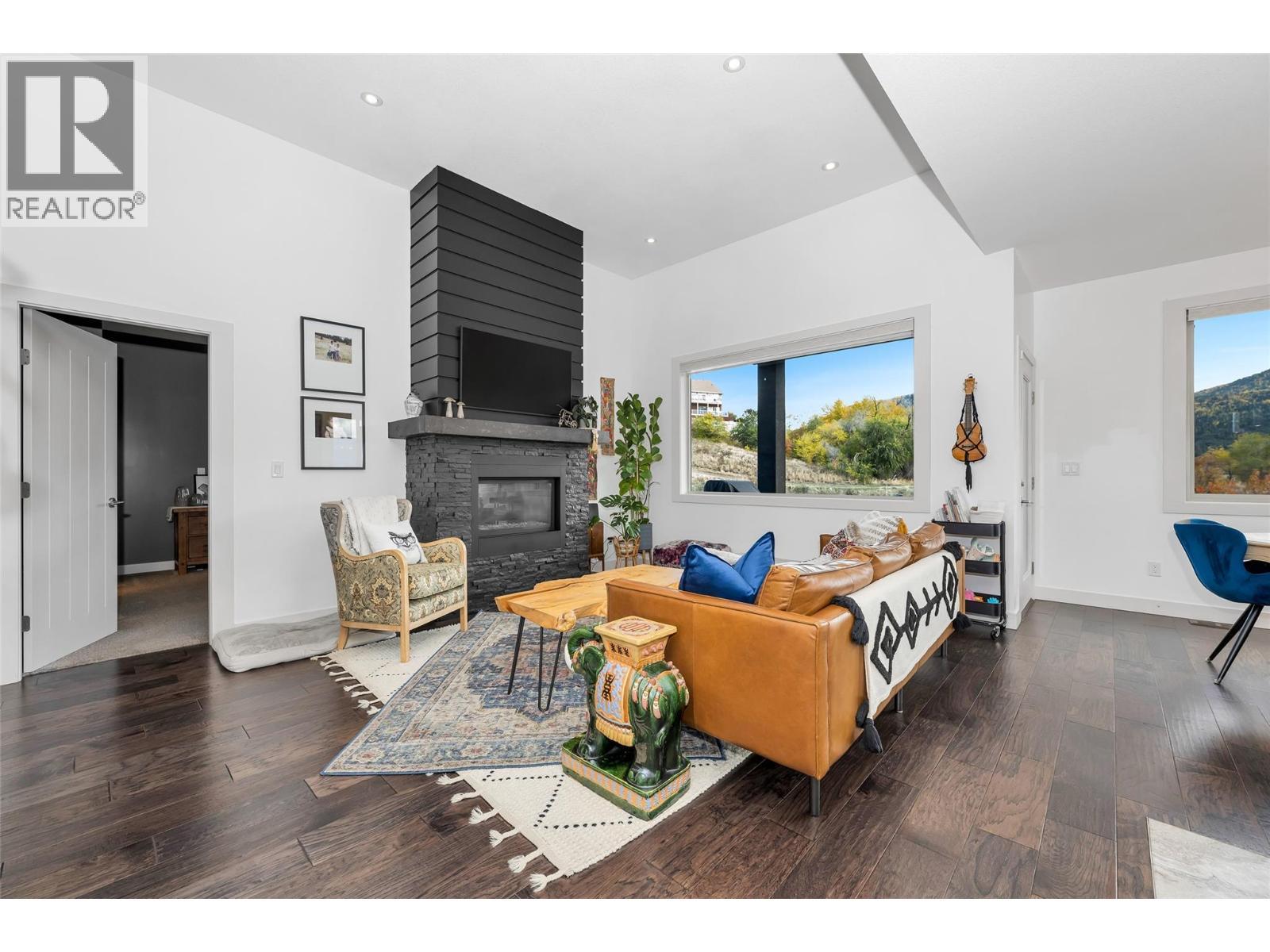 221 Kicking Horse Place, Vernon, BC - Indoor Photo Showing Living Room With Fireplace