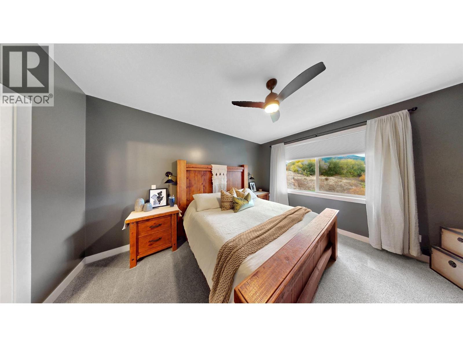 221 Kicking Horse Place, Vernon, BC - Indoor Photo Showing Bedroom