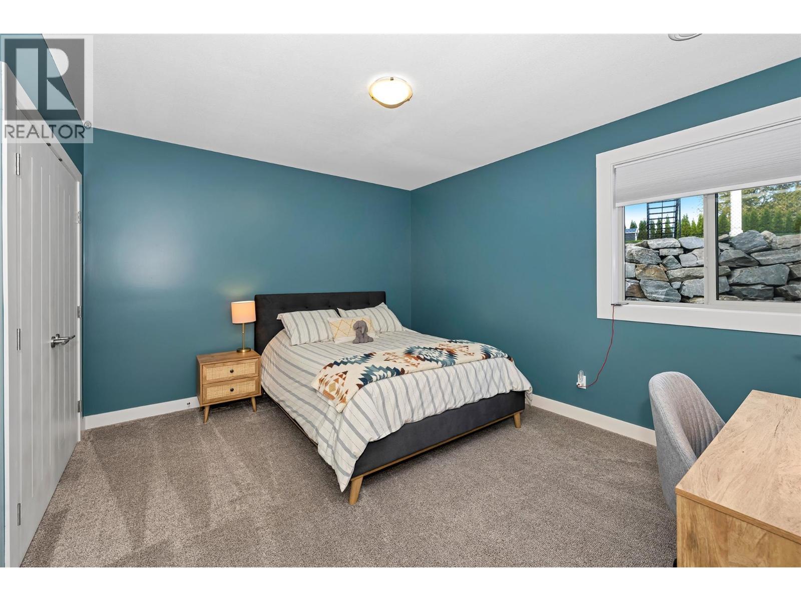 221 Kicking Horse Place, Vernon, BC - Indoor Photo Showing Bedroom