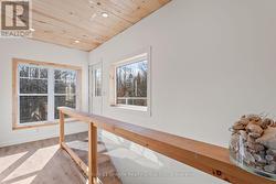 Hallway with Exterior Door to Rooftop Patio -