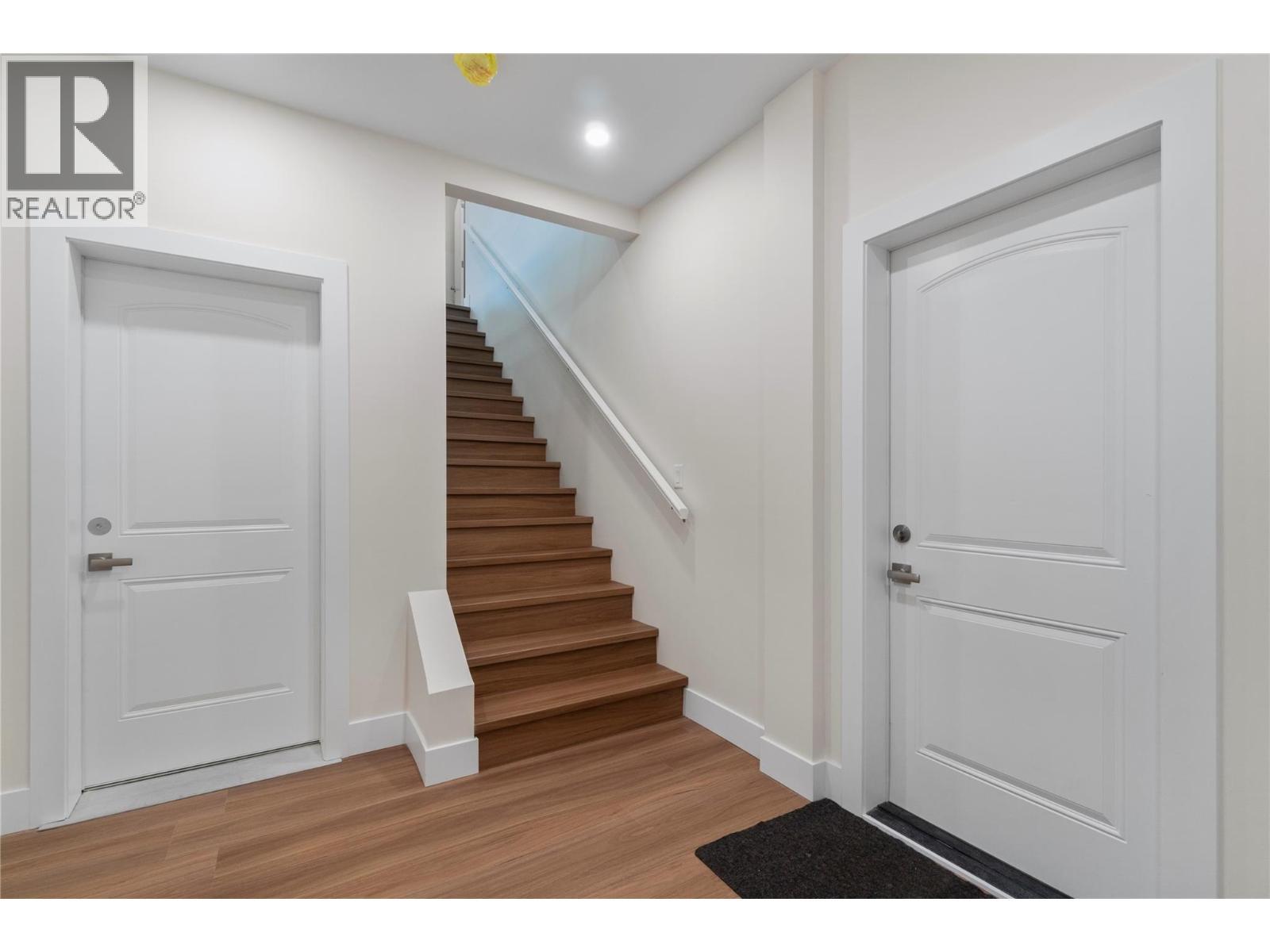 Lower Foyer with utility door and garage door - 633 9 Street Se, Salmon Arm, BC - Indoor Photo Showing Other Room