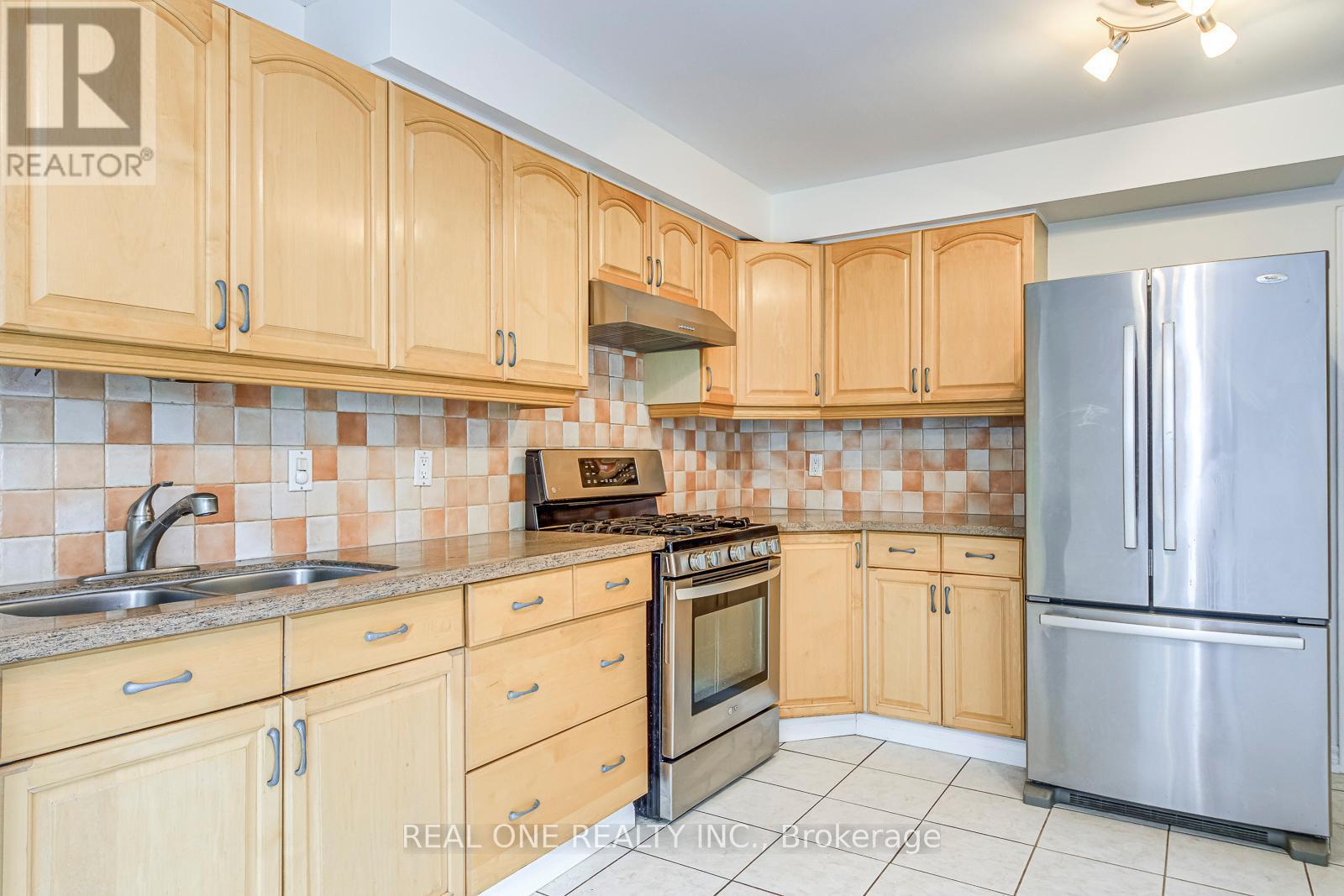 220 Kingsbridge Garden Circle, Mississauga, ON - Indoor Photo Showing Kitchen With Double Sink