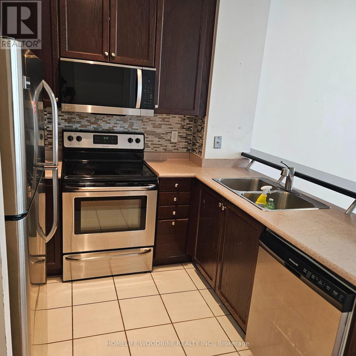 3006 - 3939 Duke Of York Boulevard, Mississauga, ON - Indoor Photo Showing Kitchen With Stainless Steel Kitchen With Double Sink