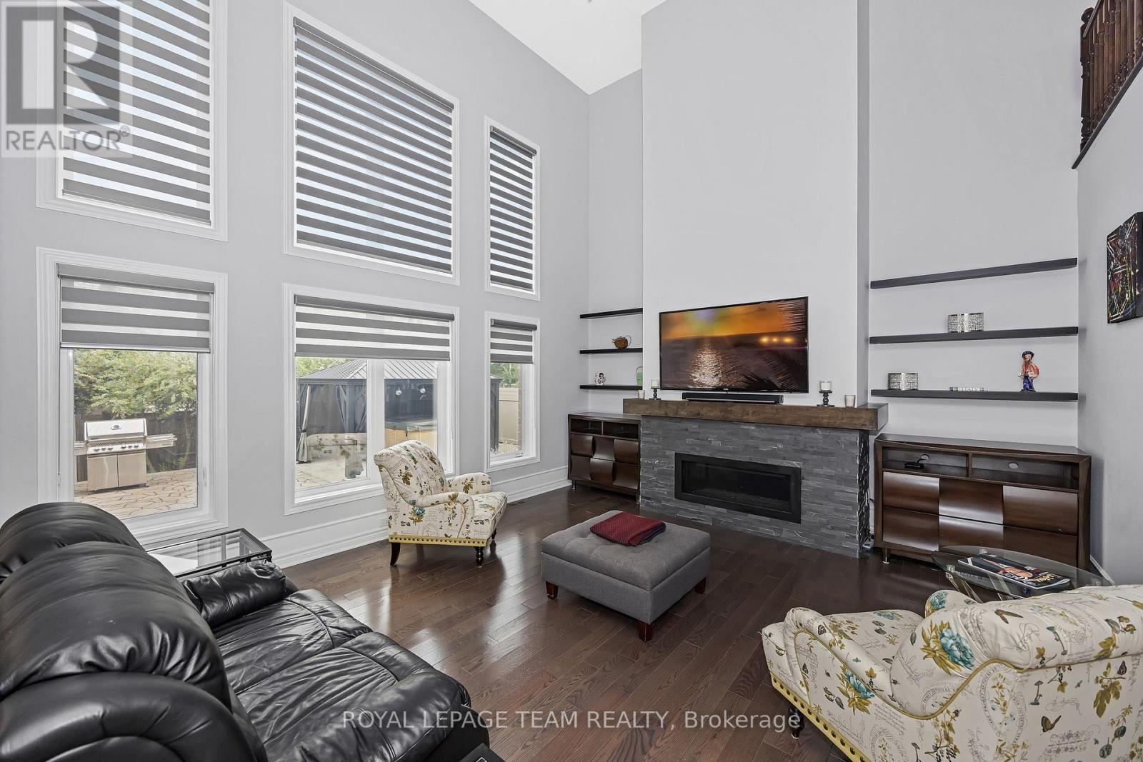 51 Bridle Crest Court, Ottawa, ON - Indoor Photo Showing Living Room With Fireplace