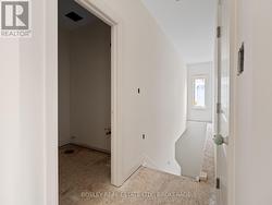 Powder room and stairs to basement -