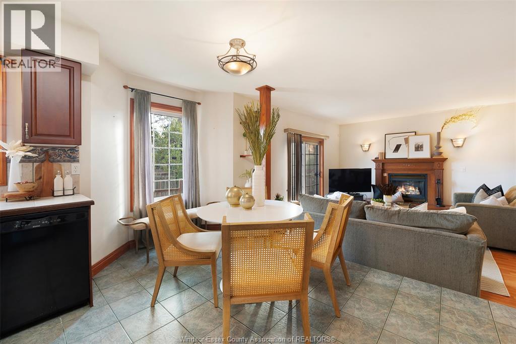 11363 Amalfi, Windsor, ON - Indoor Photo Showing Dining Room With Fireplace