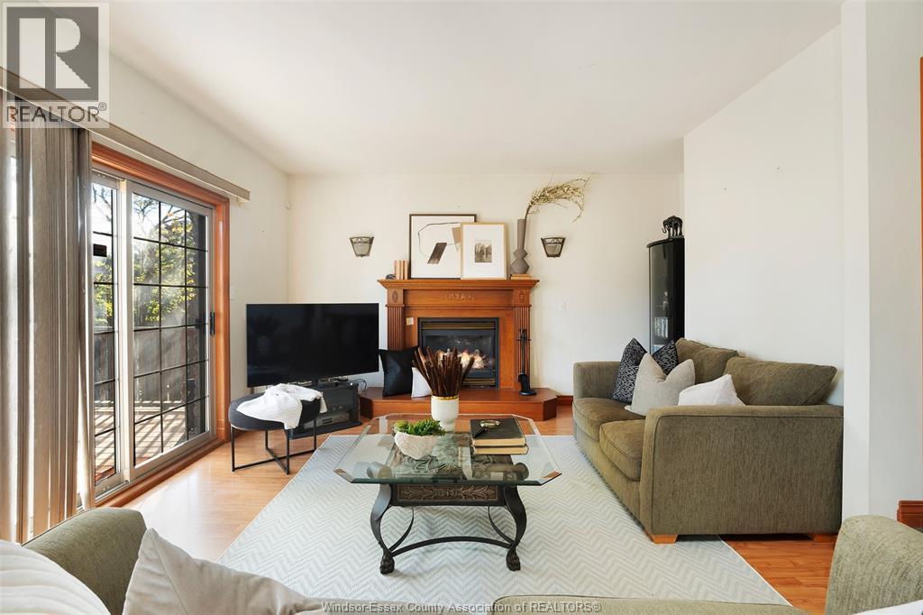 11363 Amalfi, Windsor, ON - Indoor Photo Showing Living Room With Fireplace