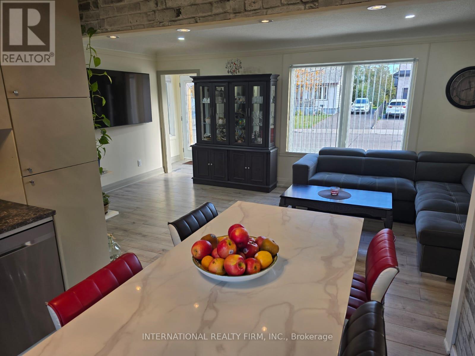 Dinning Room and Living Room view - 731 Knox Avenue, Hamilton, ON - Indoor Photo Showing Living Room