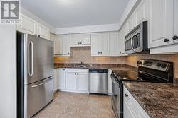 Kitchen Features Stainless Steel Appliances -