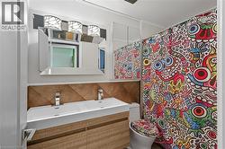 2nd Floor Full bath with vanity and a shower with shower curtain -
