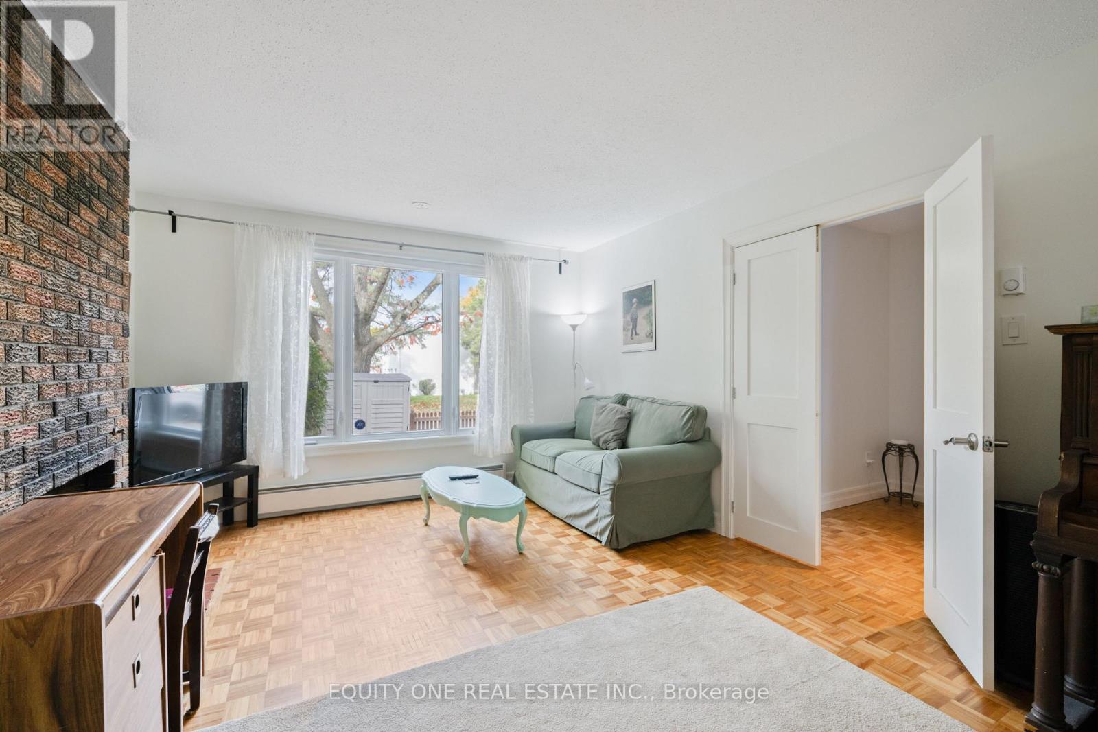 73 Hobart Crescent, Ottawa, ON - Indoor Photo Showing Living Room With Fireplace