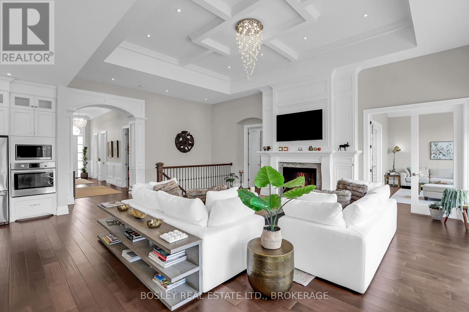 The heart of 32 Philmori Blvd. - 32 Philmori Boulevard, Pelham (Fonthill), ON - Indoor Photo Showing Living Room With Fireplace