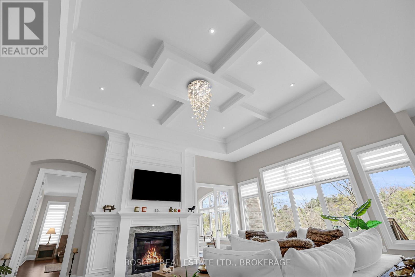 14ft. Waffle Coffered Ceiling, a standout feature! - 32 Philmori Boulevard, Pelham (Fonthill), ON - Indoor Photo Showing Living Room With Fireplace