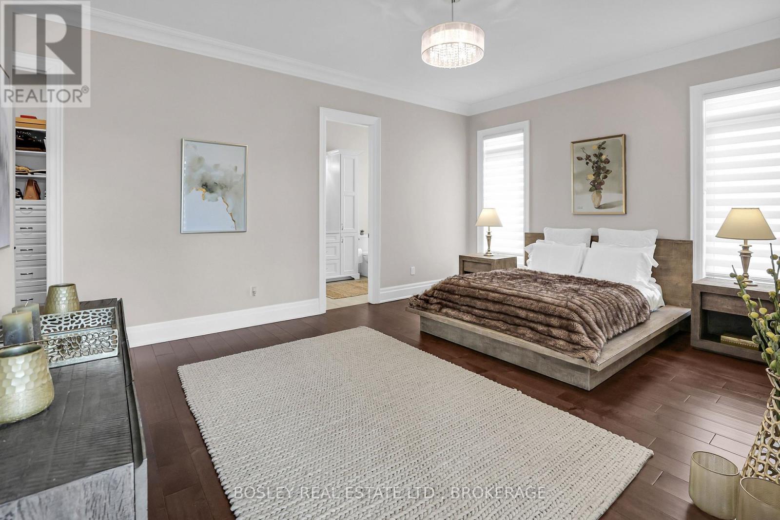 Primary Bedroom with 2 walk in closets. - 32 Philmori Boulevard, Pelham (Fonthill), ON - Indoor Photo Showing Bedroom