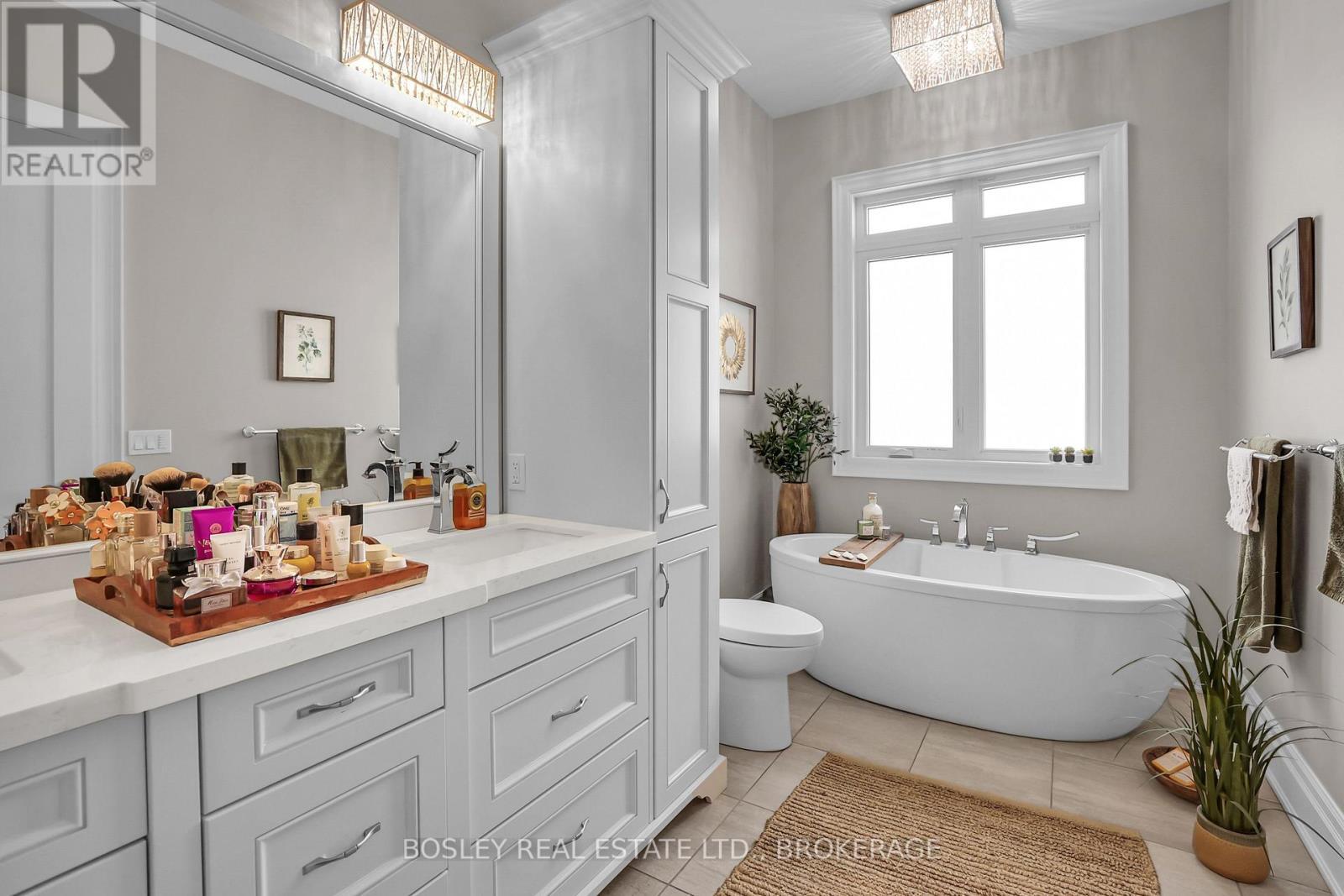 ...with Quartz Countertops and Soaker Tub - 32 Philmori Boulevard, Pelham (Fonthill), ON - Indoor Photo Showing Bathroom