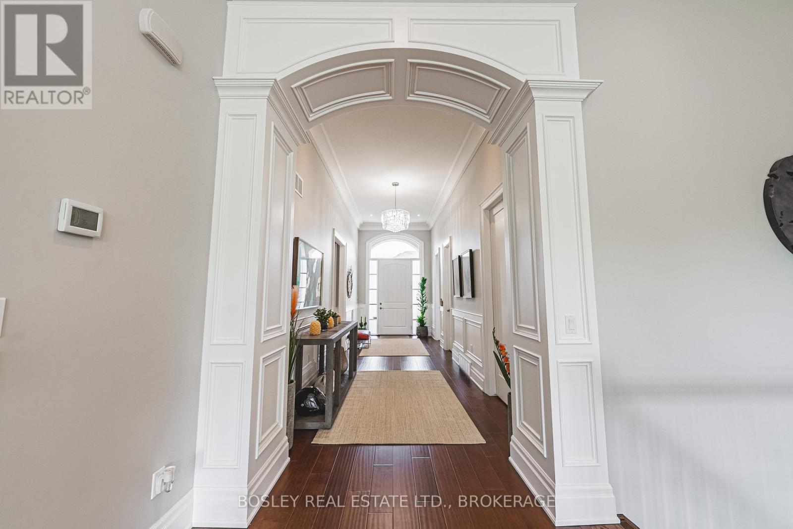 This archway is a beautiful design feature - 32 Philmori Boulevard, Pelham (Fonthill), ON - Indoor Photo Showing Other Room