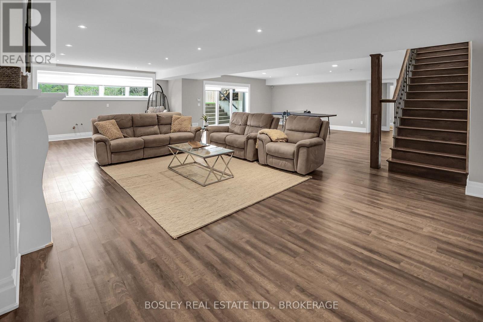 Expansive great room with gas fireplace #2 - 32 Philmori Boulevard, Pelham (Fonthill), ON - Indoor Photo Showing Living Room