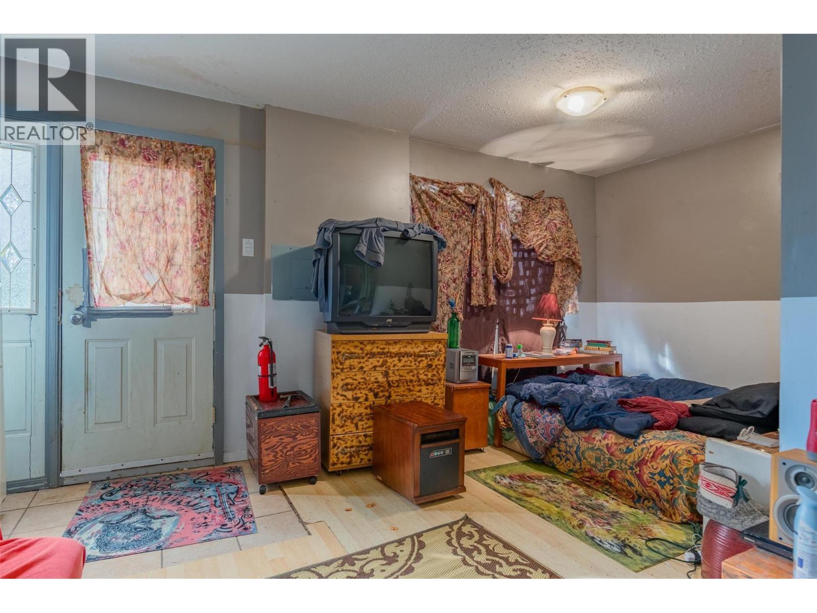 1976 Watson Lane, Fruitvale, BC - Indoor Photo Showing Bedroom