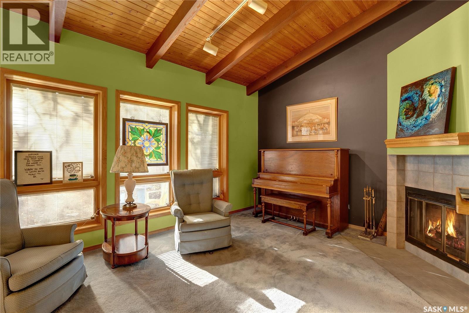 3047 Whitmore Avenue, Regina, SK - Indoor Photo Showing Living Room With Fireplace