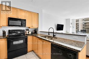 701 - 570 Laurier Avenue W, Ottawa, ON - Indoor Photo Showing Kitchen With Double Sink