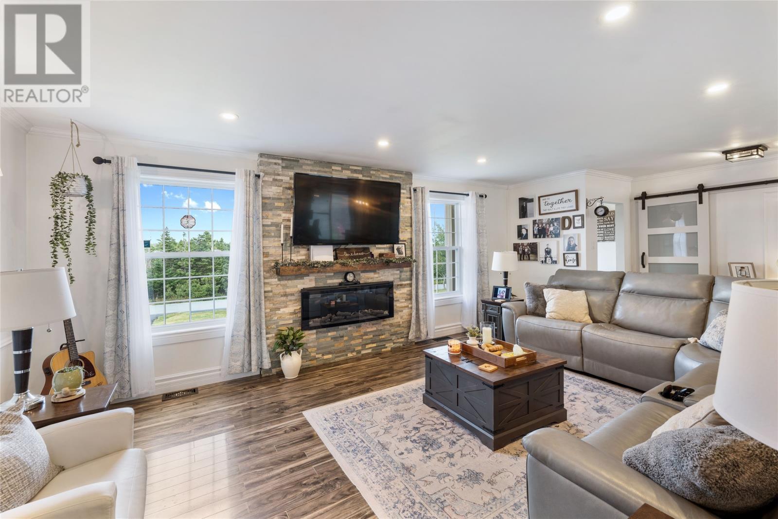 22-24 Kingmans Cove Road, Fermeuse, NL - Indoor Photo Showing Living Room With Fireplace