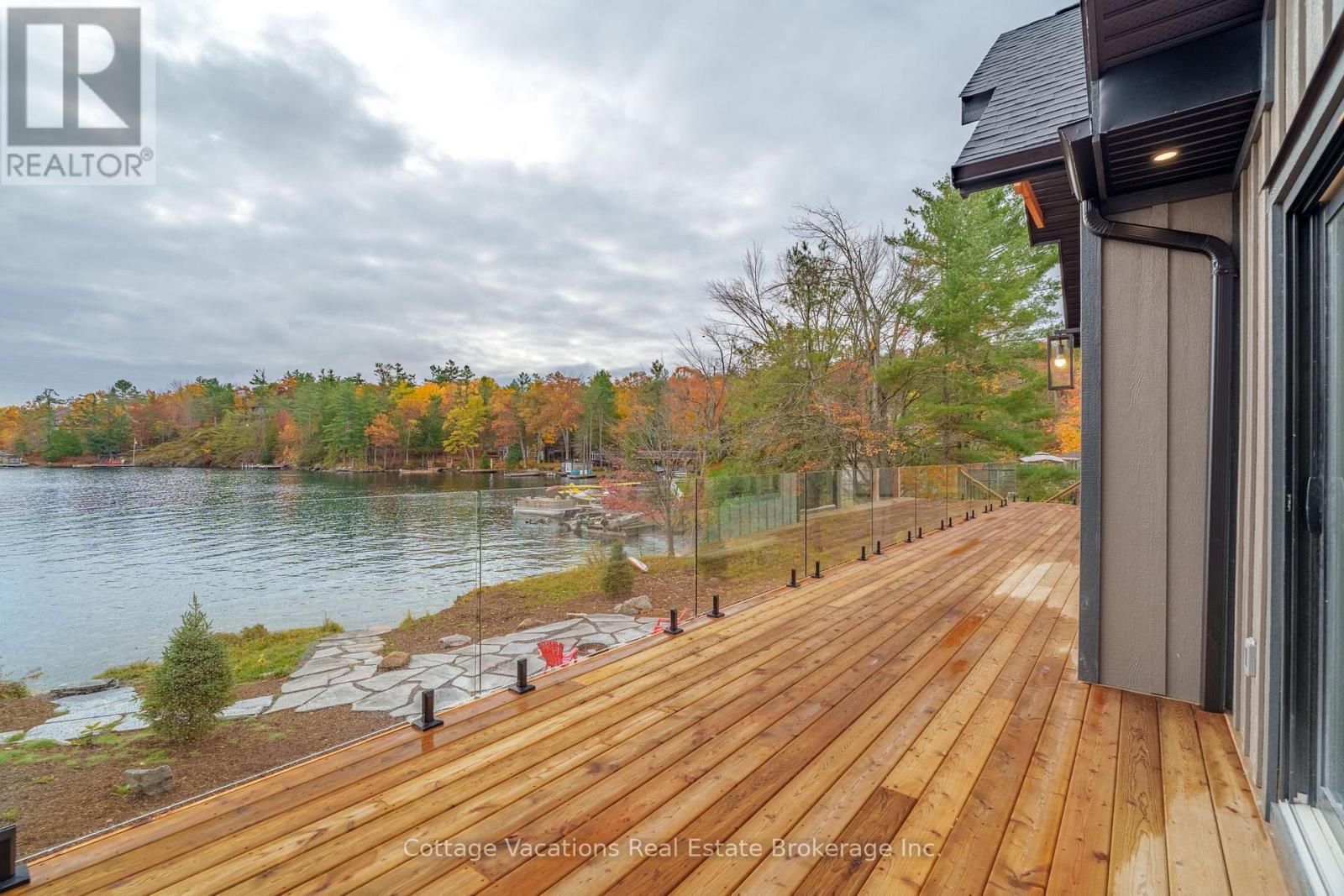 1111 Lakeshore Drive, Gravenhurst (Muskoka (S)), ON - Outdoor With Body Of Water With Deck Patio Veranda With View