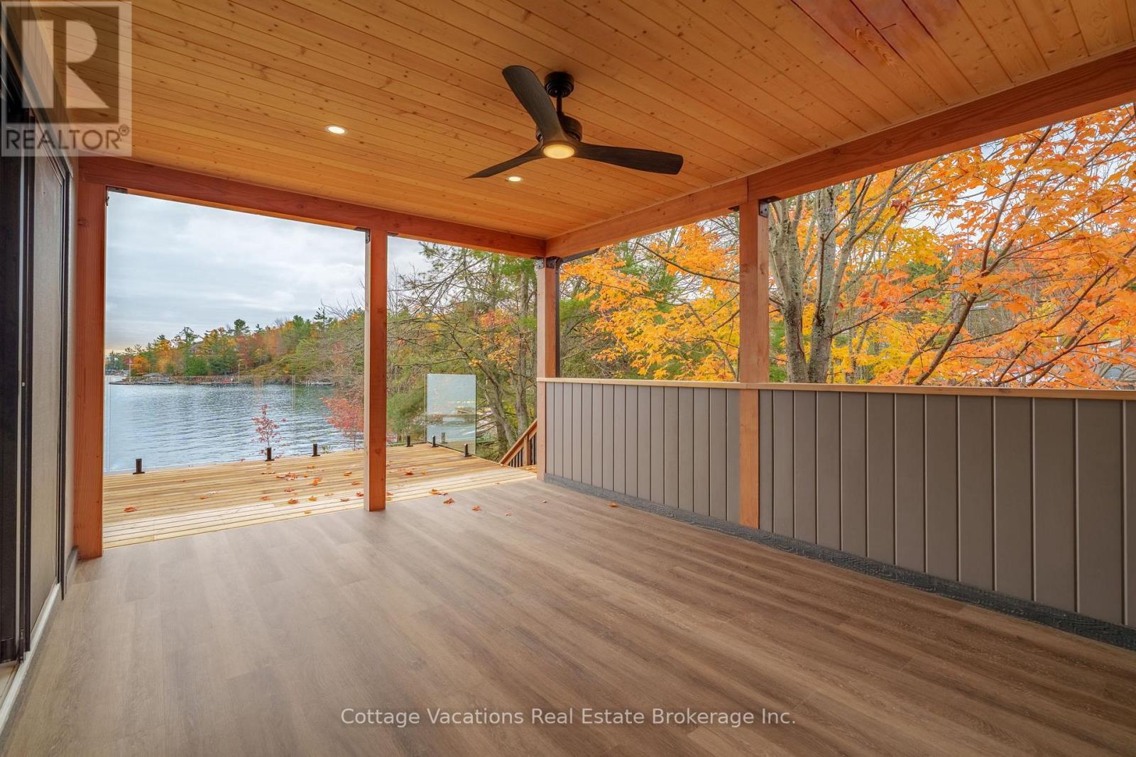 1111 Lakeshore Drive, Gravenhurst (Muskoka (S)), ON - Outdoor With Body Of Water With Deck Patio Veranda With Exterior