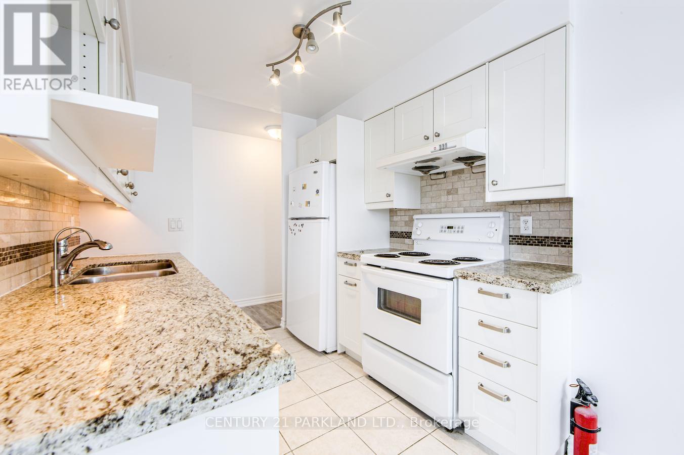 1701 - 8 Rean Drive, Toronto, ON - Indoor Photo Showing Kitchen With Double Sink