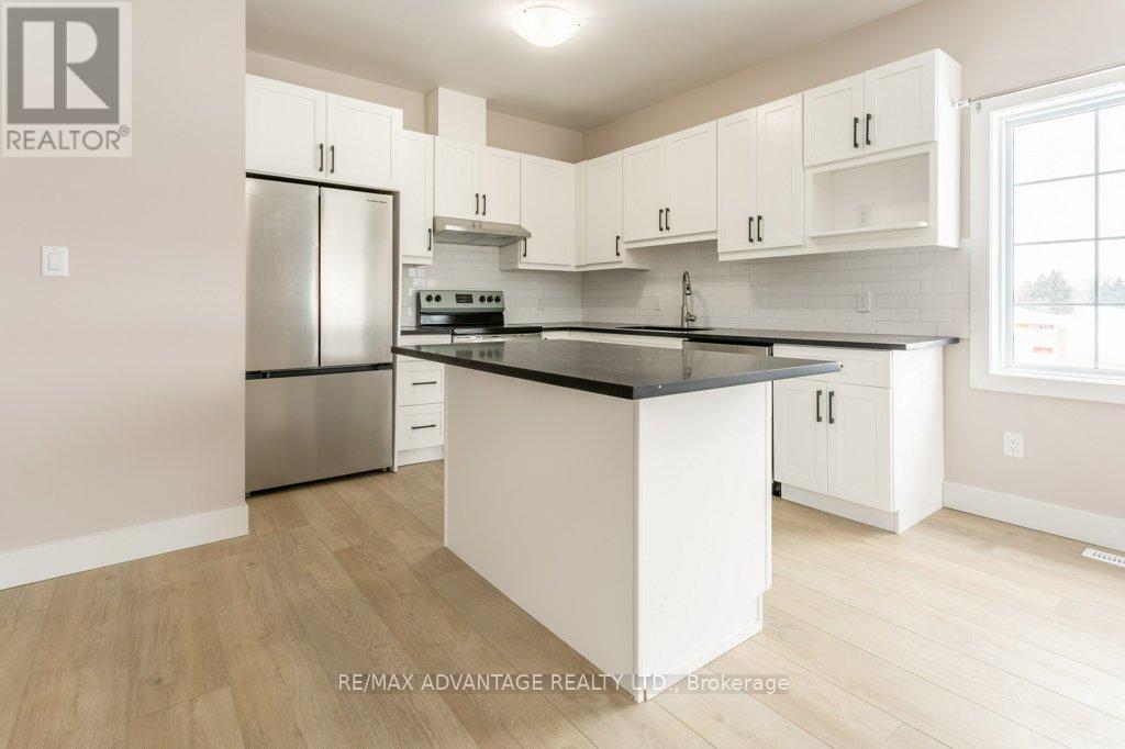 1 - 299 Tartan Drive, London East (East I), ON - Indoor Photo Showing Kitchen With Stainless Steel Kitchen With Upgraded Kitchen
