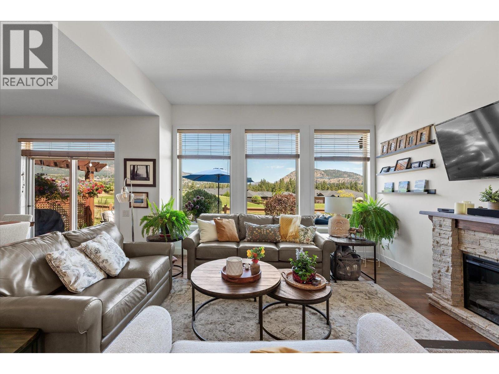 2140 Serrento Lane, Westbank, BC - Indoor Photo Showing Living Room With Fireplace