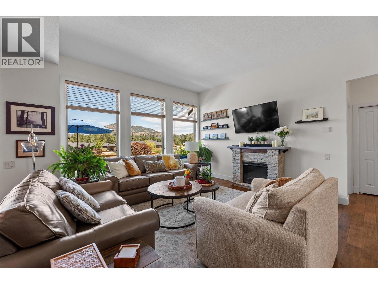 2140 Serrento Lane, Westbank, BC - Indoor Photo Showing Living Room With Fireplace