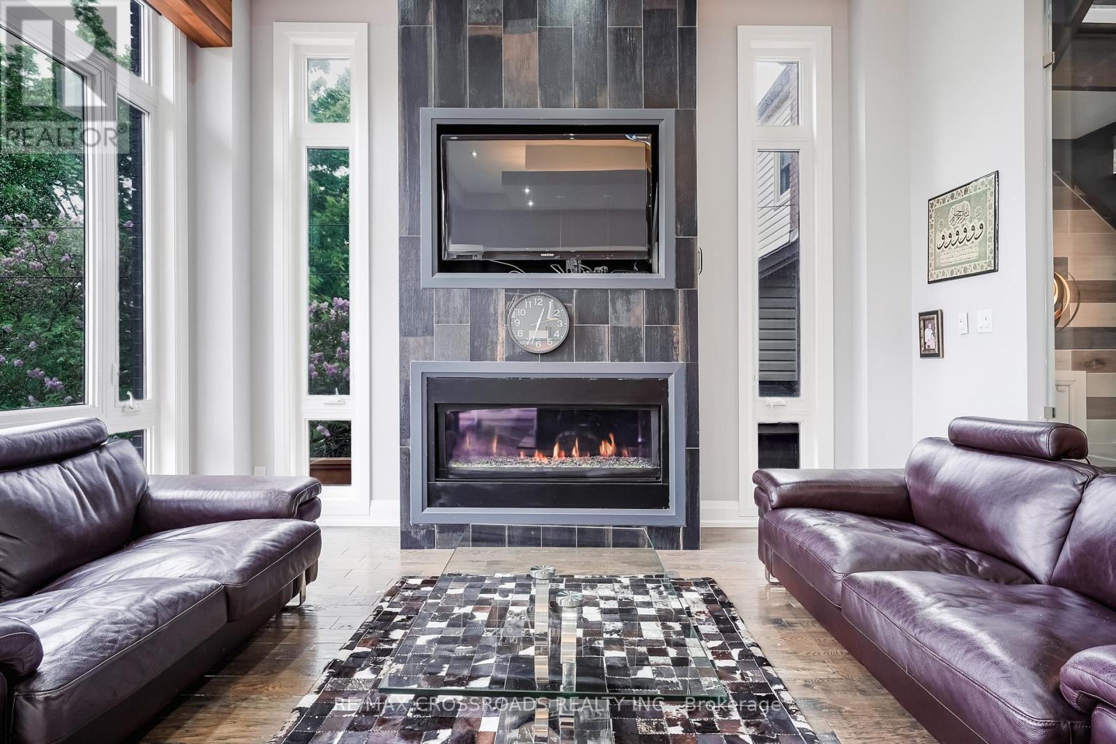 1A Roblin Avenue, Toronto, ON - Indoor Photo Showing Living Room With Fireplace