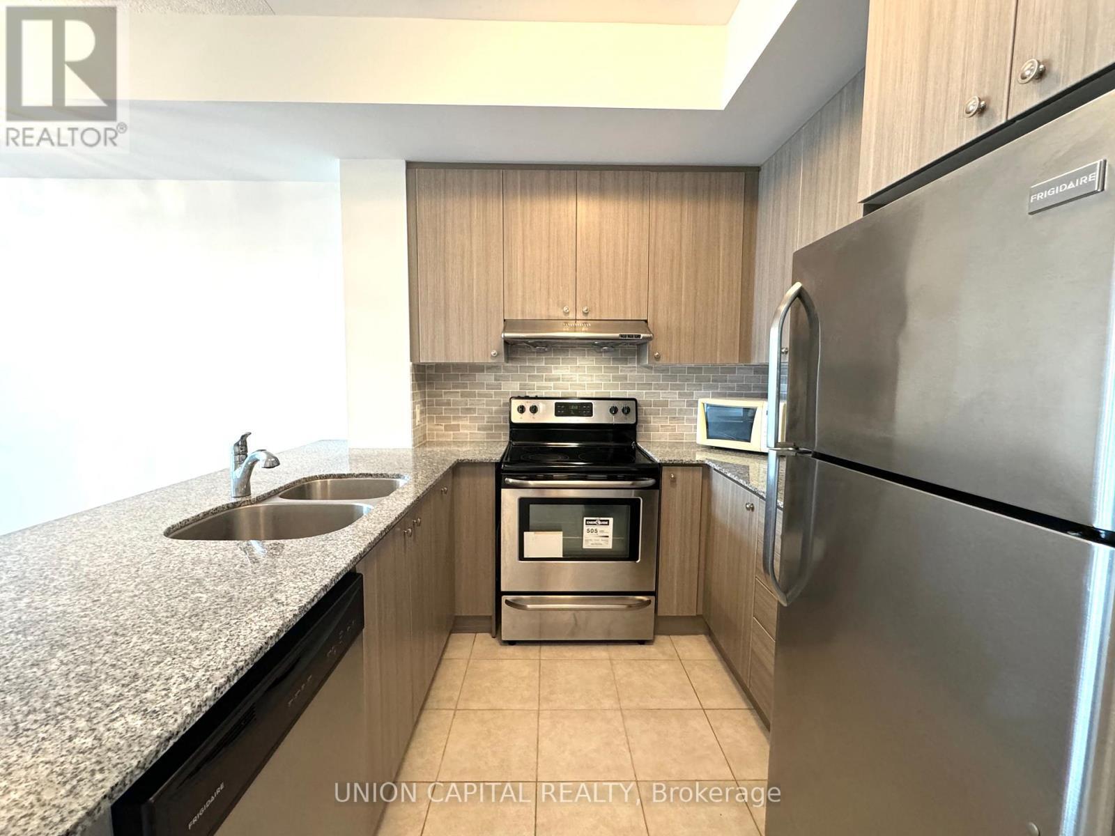 217 - 8323 Kennedy Road, Markham, ON - Indoor Photo Showing Kitchen With Stainless Steel Kitchen With Double Sink With Upgraded Kitchen