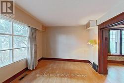 Formal living room faces west; hardwood floor. -