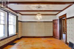 Formal dining room; decorative plate rail. -
