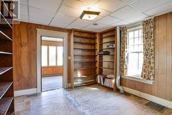 Main floor den/office; B/I bookcases. -