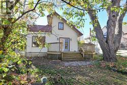 Second floor sundeck overlooks the backyard. -