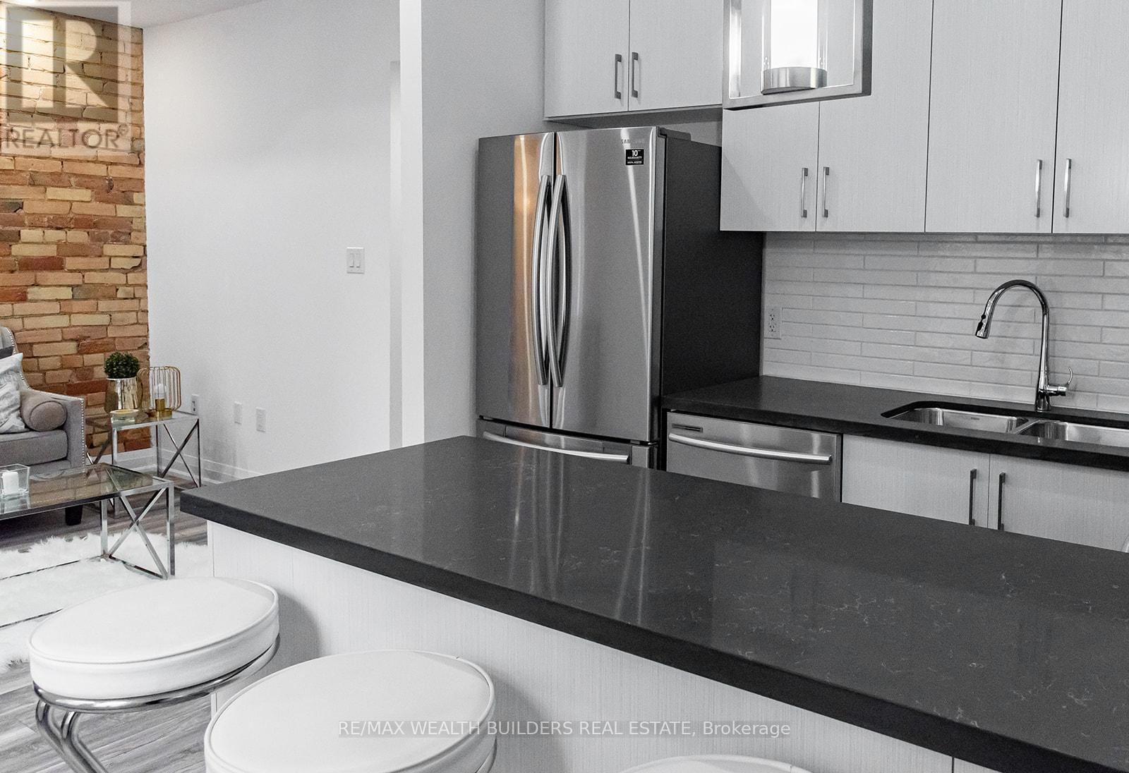 6 - 213 Jarvis Street, Toronto, ON - Indoor Photo Showing Kitchen With Stainless Steel Kitchen With Double Sink With Upgraded Kitchen