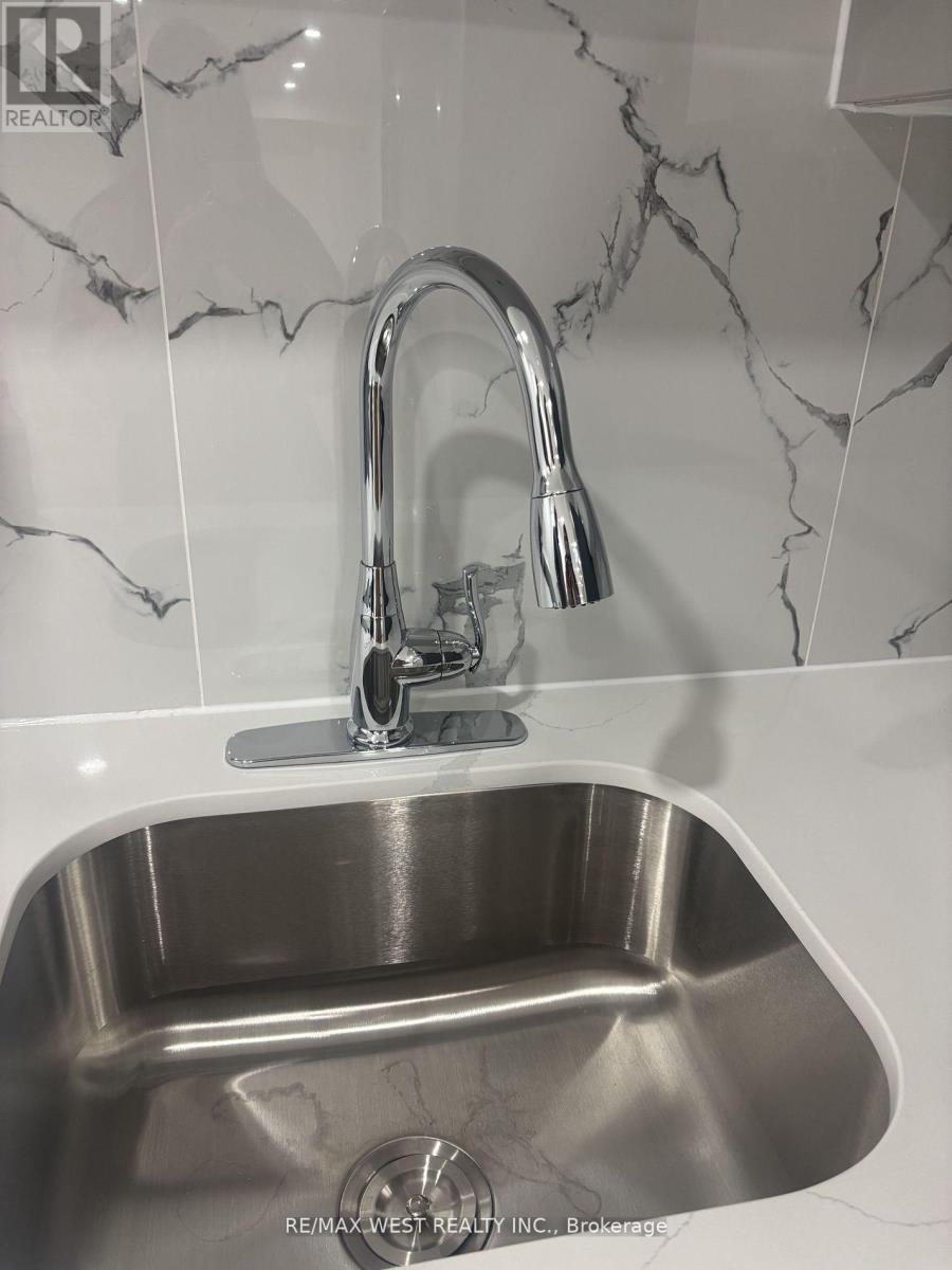 Basement Unit - 7 Locomotive Crescent, Brampton, ON - Indoor Photo Showing Kitchen With Double Sink