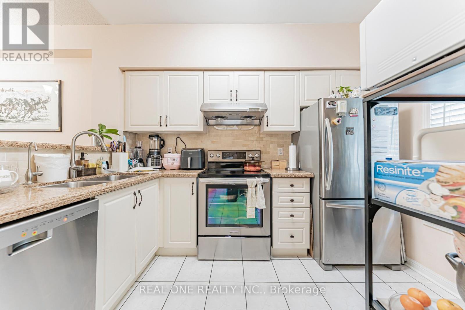 5 - 8 St Moritz Way, Markham, ON - Indoor Photo Showing Kitchen With Double Sink