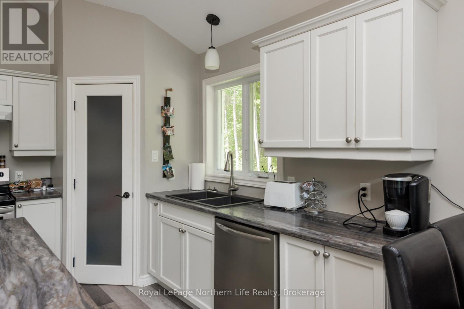 522 Hart Road, Callander, ON - Indoor Photo Showing Kitchen With Double Sink