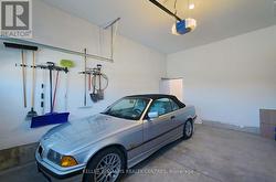 Large garage with entrance to back yard -