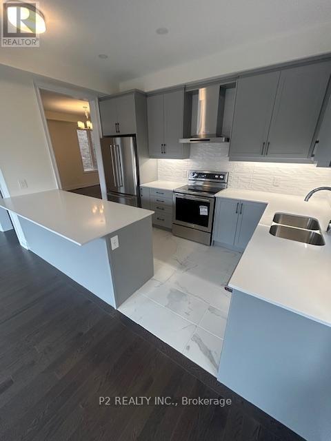34 Wild Ginger Lane, Springwater, ON - Indoor Photo Showing Kitchen With Double Sink