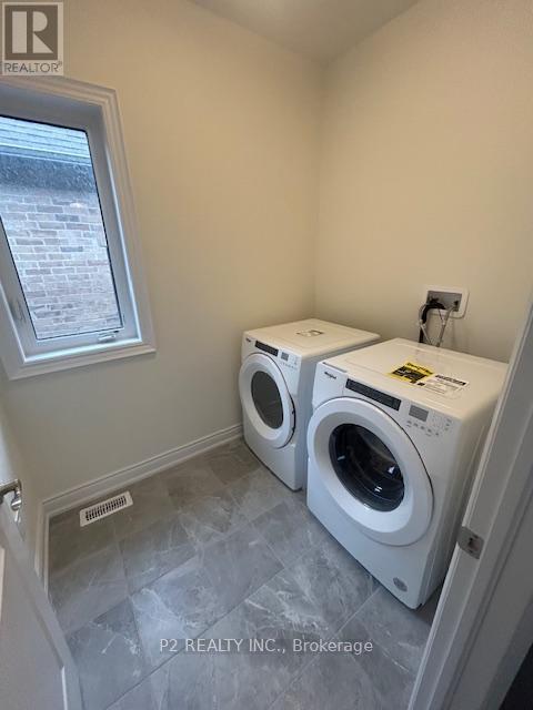 34 Wild Ginger Lane, Springwater, ON - Indoor Photo Showing Laundry Room