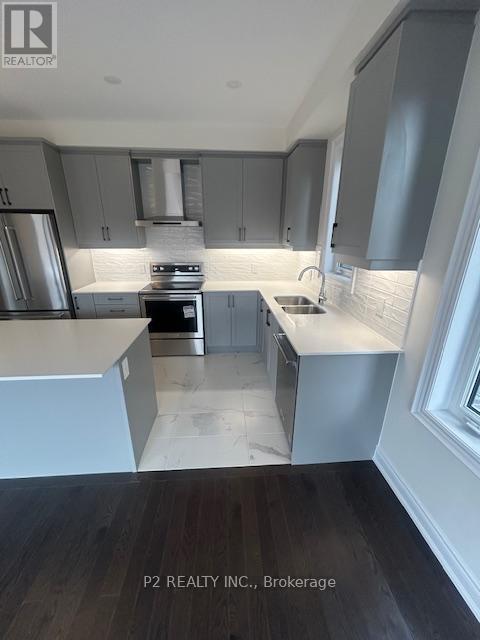 34 Wild Ginger Lane, Springwater, ON - Indoor Photo Showing Kitchen With Double Sink