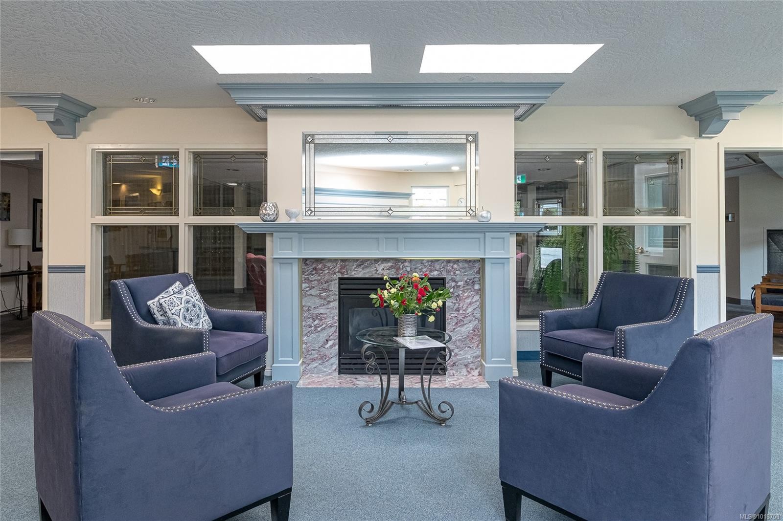 105-1521 Church Ave, Saanich, BC - Indoor Photo Showing Living Room With Fireplace